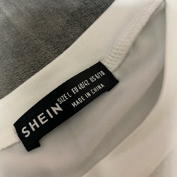 SHEIN long sleeve white asymmetrical top with black piping - Picture 6 of 6